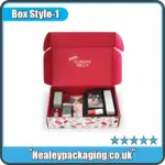Custom red interior mailer box with branded Sunday Riley cosmetic products arranged inside.