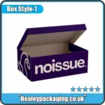 Purple custom printed shoe box with hinged lid, branded “noissue,” partially open to reveal the inside
