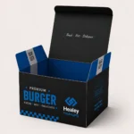Open printed cardboard burger box with black and blue branding