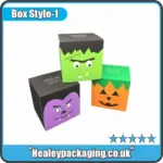 Trio of colourful Halloween cube boxes featuring cartoon characters