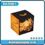 Black and orange Halloween box with spooky pumpkin artwork and "Happy Halloween" text.