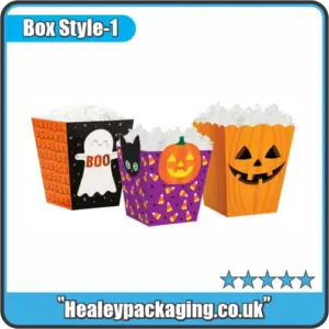 Colourful Halloween popcorn boxes with ghost, pumpkin and cat designs filled with white popcorn