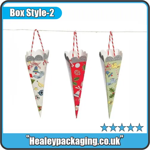 Festive cone-shaped hanging boxes in red, green, and cream prints, decorated with holiday patterns and ribbons.