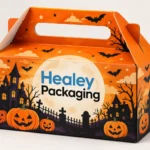 Orange Halloween gable gift box with carry handle, pumpkins and haunted house design.