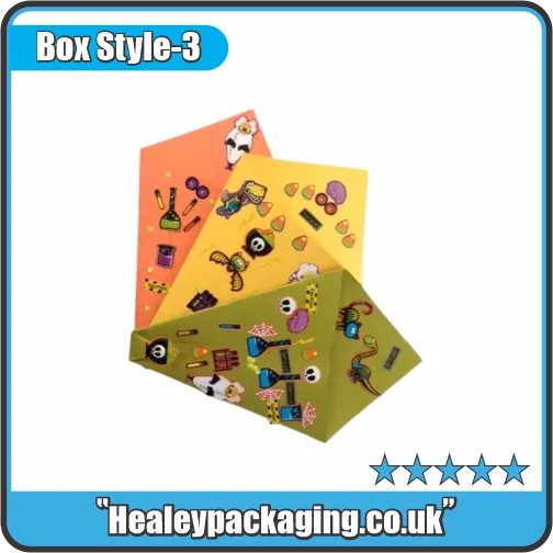 Colourful Halloween cone boxes featuring spooky stickers and playful printed designs for sweet packaging.