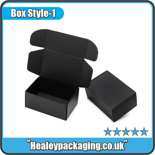 Black cardboard mailer-style box with open flaps, shown alongside a closed version for product packaging.
