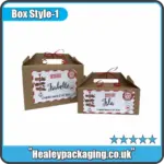 Personalised brown Christmas Eve boxes with red ribbons and festive name tags for children.