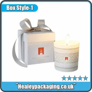 Luxury candle gift box with ribbon, shown alongside a lit scented candle, designed for premium 20cl candle packaging.