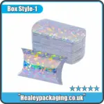 Pack of holographic pillow boxes with reflective prism pattern.