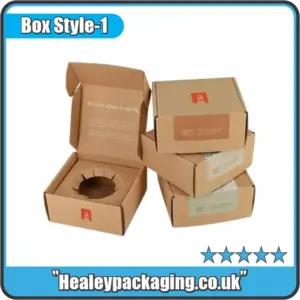 Custom kraft candle boxes with branded printing, stacked to show retail-ready candle packaging design.