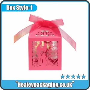 Decorative laser cut gift box with ribbon, designed for wedding favours and special gift packaging.