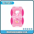 Pink Barbie pillow-style packaging box with die-cut shape and branded graphic design