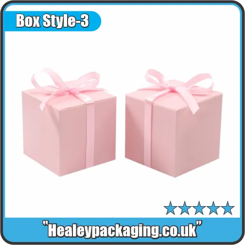Pink gift boxes with satin ribbon bows for elegant present packaging