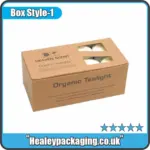 Printed kraft organic tealight candle box with cut-out windows showing white tealight candles inside