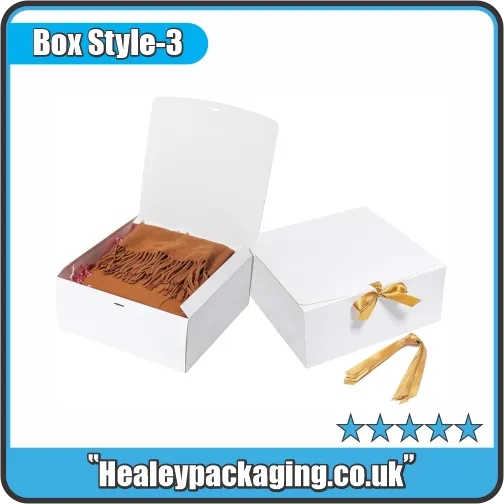 White rigid gift box with decorative ribbon, used for elegant gift packaging and special occasions