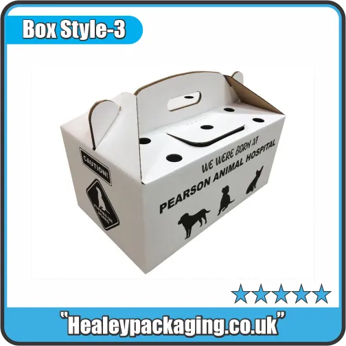 Cardboard animal carrier box with ventilation holes and carry handle