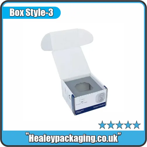 White smart switch mailer box packaging with protective insert for electronic devices.
