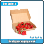 Kraft mailer box filled with fresh strawberries.