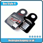 Folded bottle neck tags with printed product information.