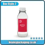 Custom printed label on a clear glass bottle.