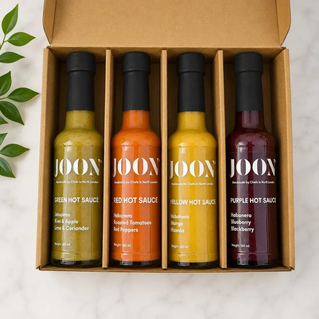 Kraft hot sauce gift box with four bottles and dividers.