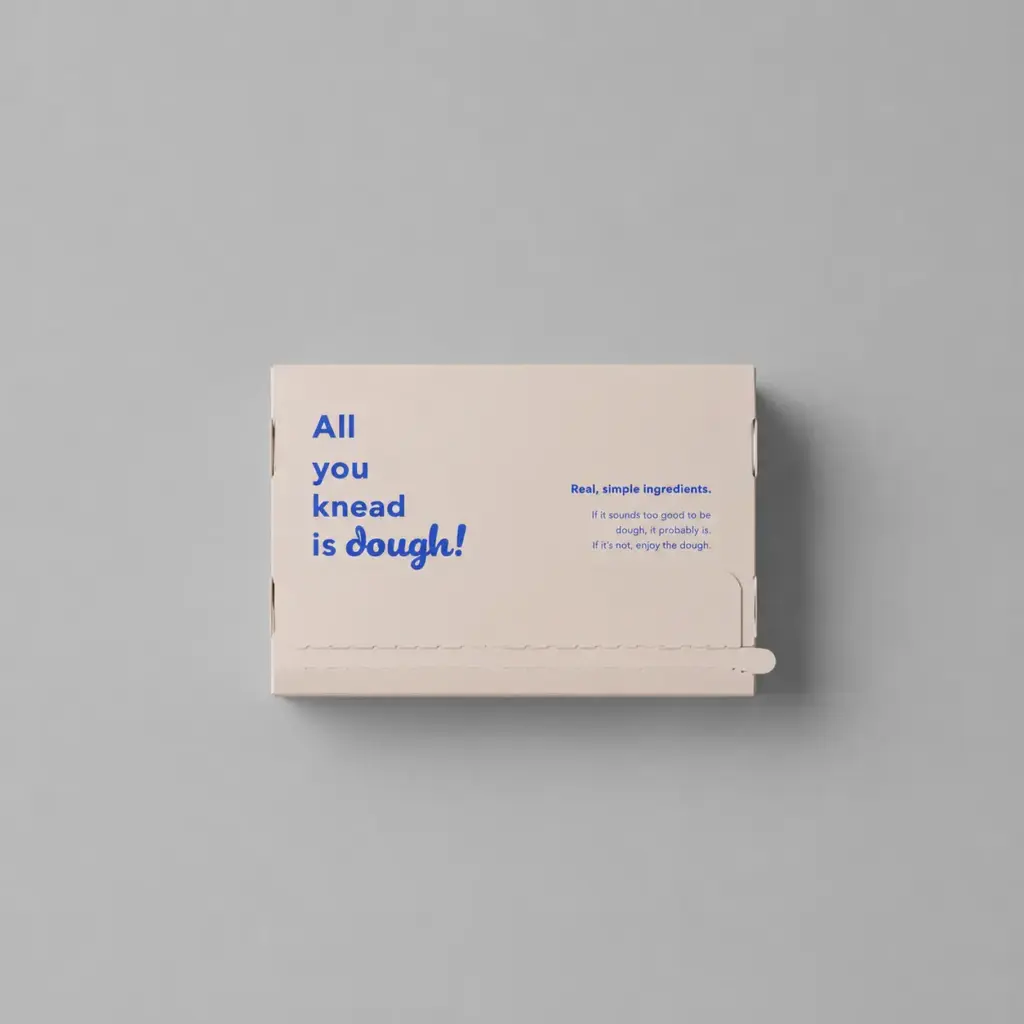 Back view of closed cookie dough packaging box with printed text