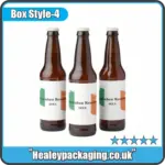 Personalised labels on brown glass bottles.