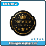 Premium black die cut sticker with gold foil printing.