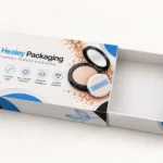 Custom compact powder sleeve packaging with a sliding tray and printed cosmetic design.