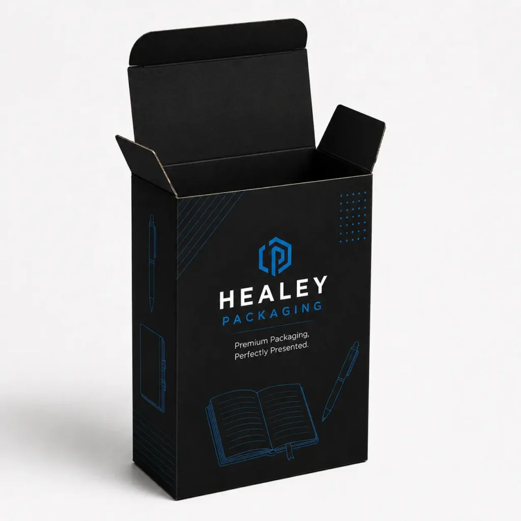 Black notebook packaging carton with open tuck-top flaps and blue printed graphics.